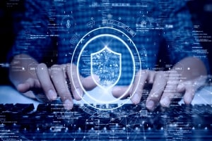 Man Accessing Computer with Protective IOT Security