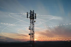 sunset view of a base station tower with a 3D graphic overlay of signal waves emitted from antennas